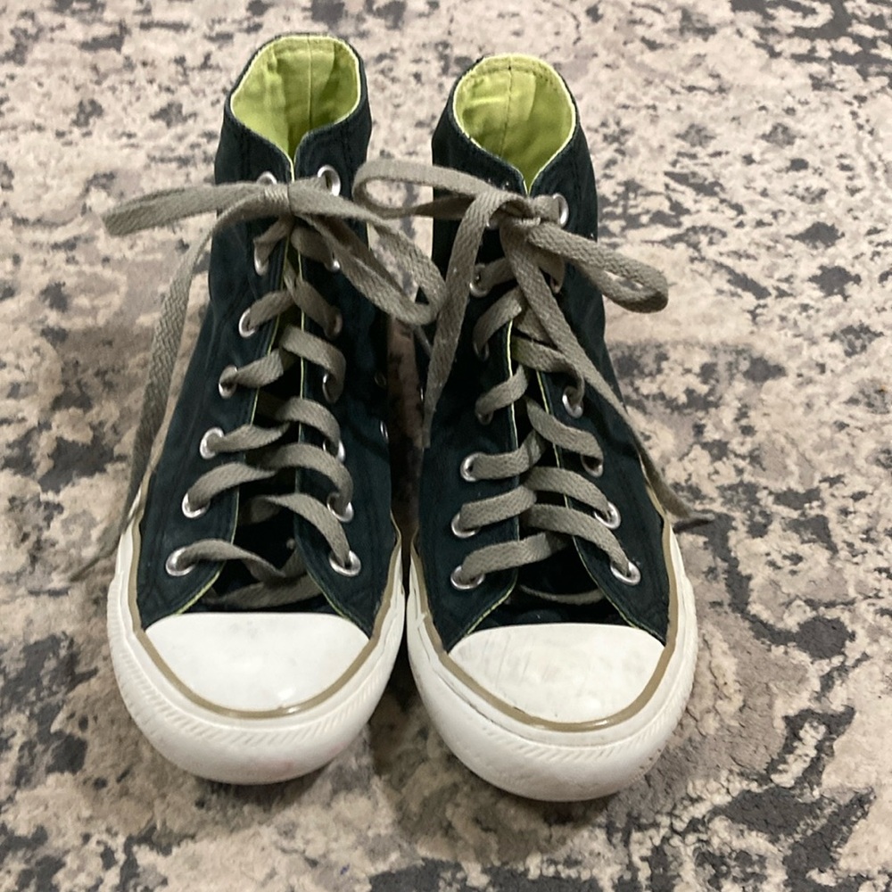 Converse Black and White High-Top Sneakers with Iconic Style